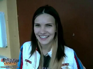 Amateur and cute brunette teen is sucking his big cock outdoors