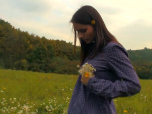 Petite and beautiful teen with nice tits is fingering her kitty outdoors